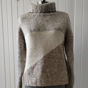 Chunky handknit rollneck sweater in natural tones, size M